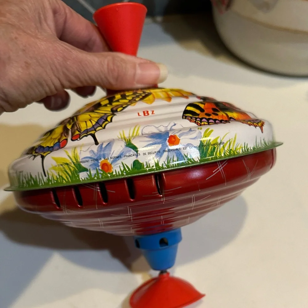VTG RARE LBZ LORENZ BOLZ ZINDORF TIN TOP FLOWER BUTTERFLY W GERMANY BOLZ TOYS 8”
